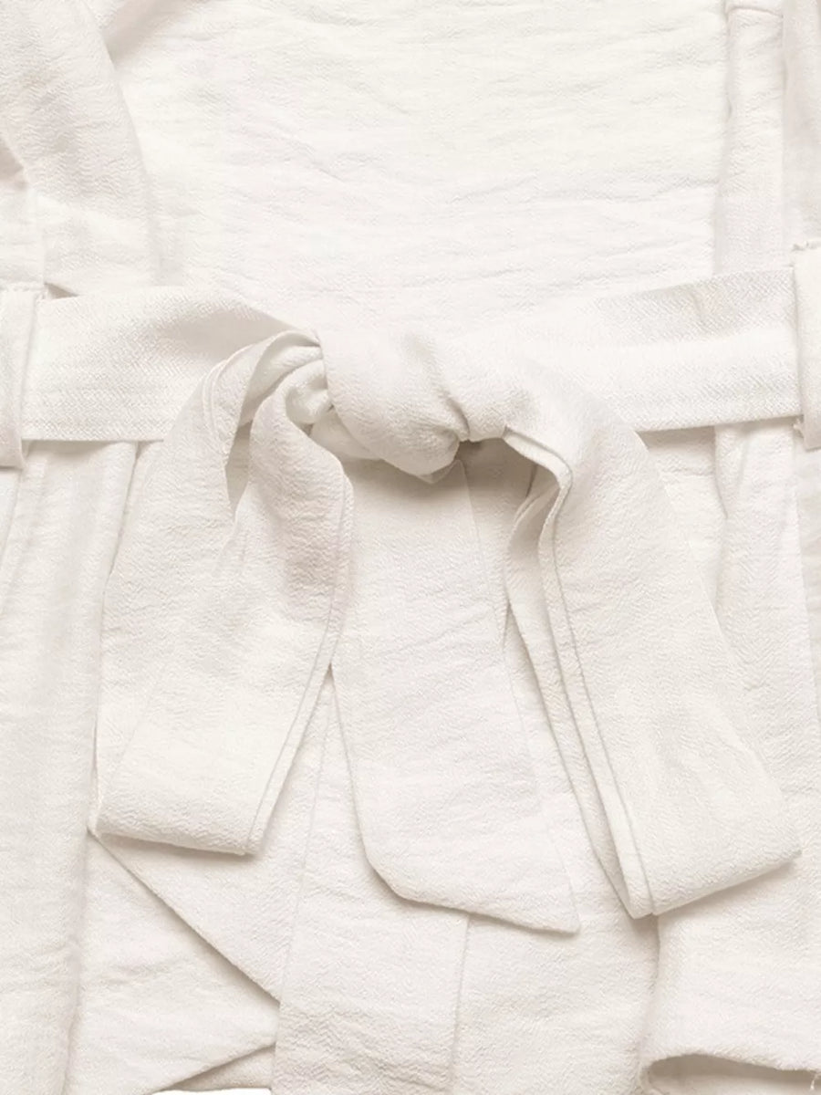 Cream one-shoulder top and geometric maxi skirt set with tie detail