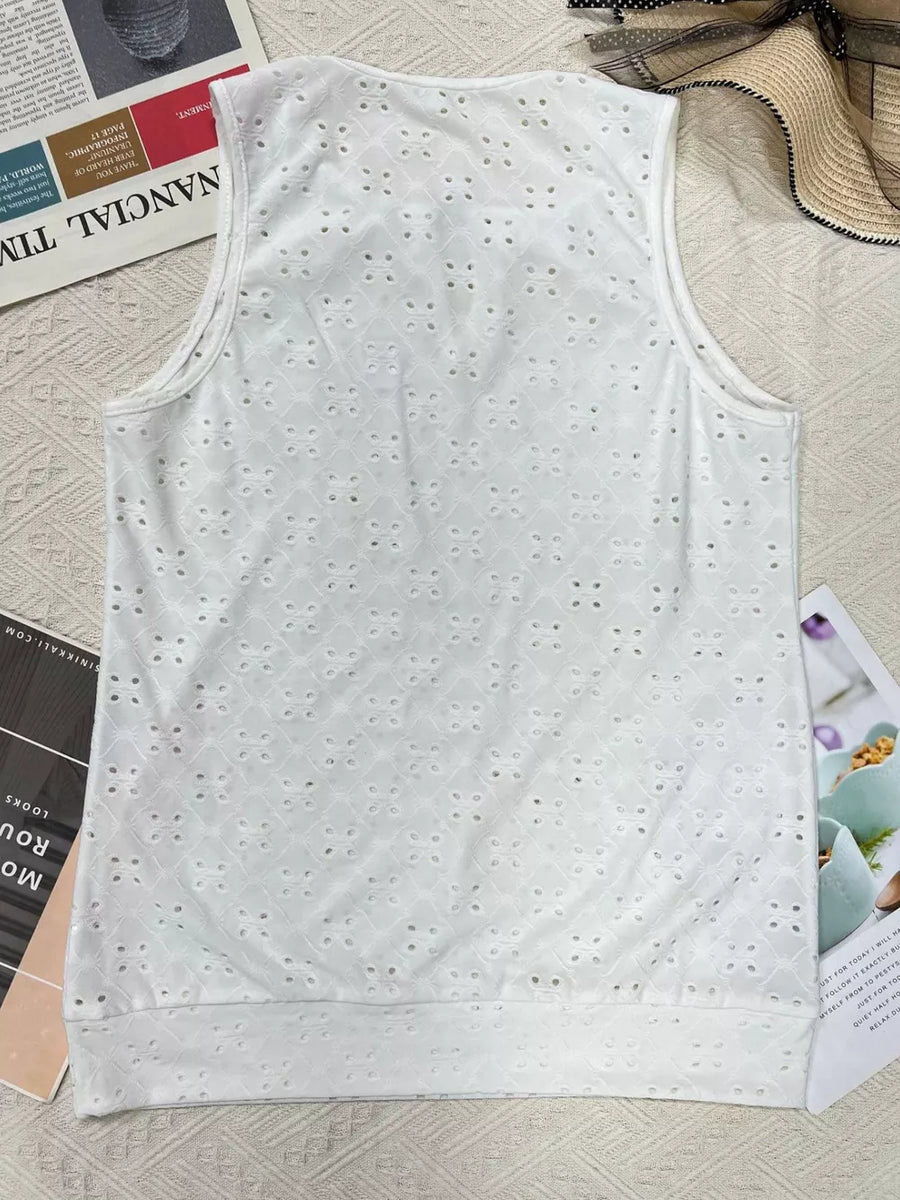 White eyelet cami tank top with a keyhole detail and a textured pattern.