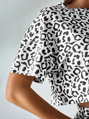 100% polyester Care instructions: Machine wash cold crop top in Black with relaxed silhouette