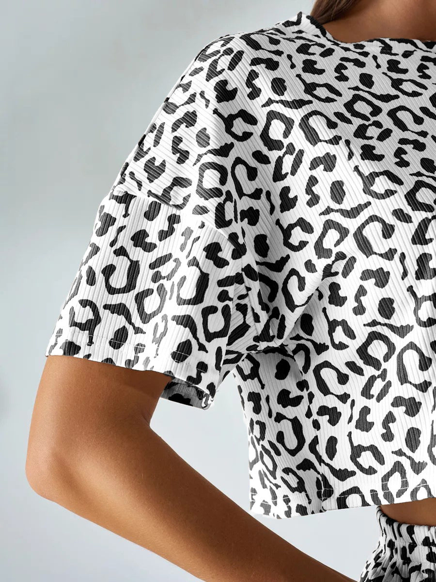 100% polyester Care instructions: Machine wash cold crop top in Black with relaxed silhouette
