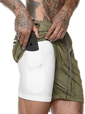 Olive green dual-layer performance shorts with built-in white compression liner and phone pocket.