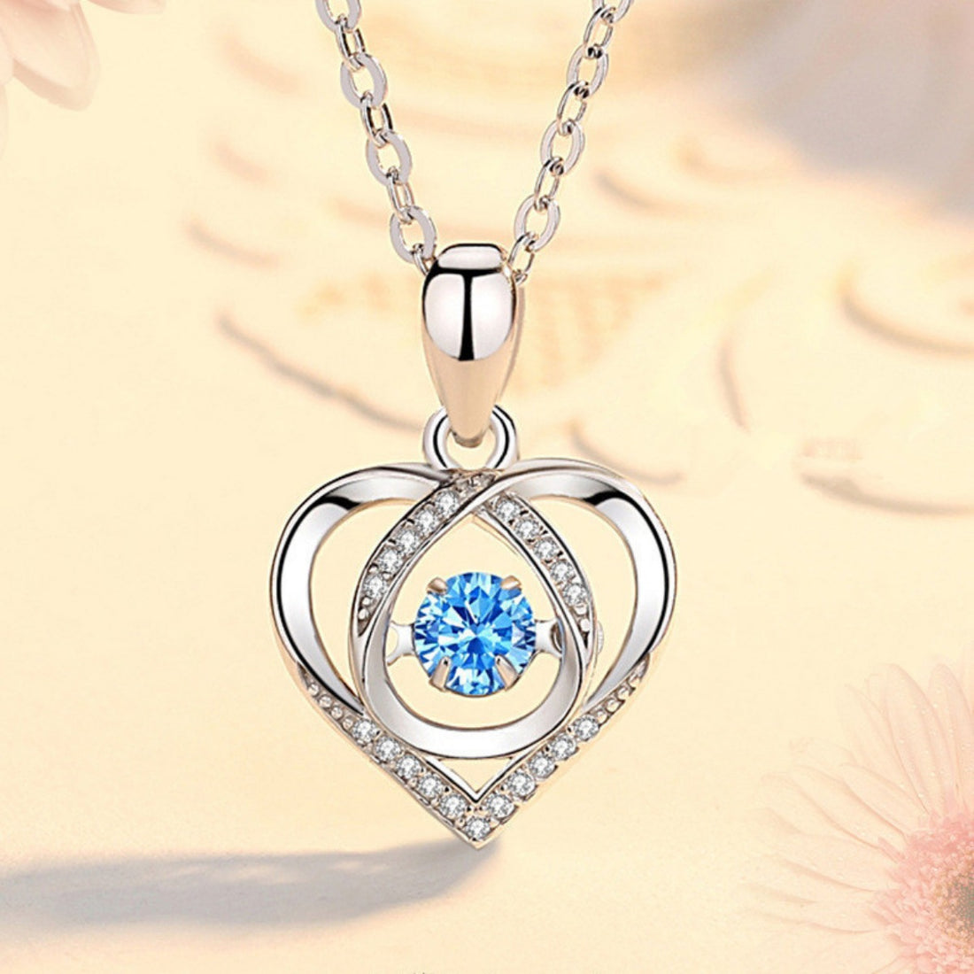 necklace in silver featuring heart pendant and heart-shaped pendant fit