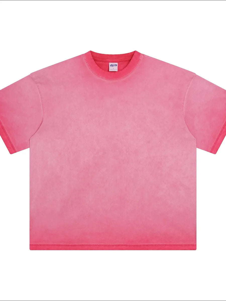 Pigment-dyed oversized tee in Hot Pink with a crew neck and short sleeves.