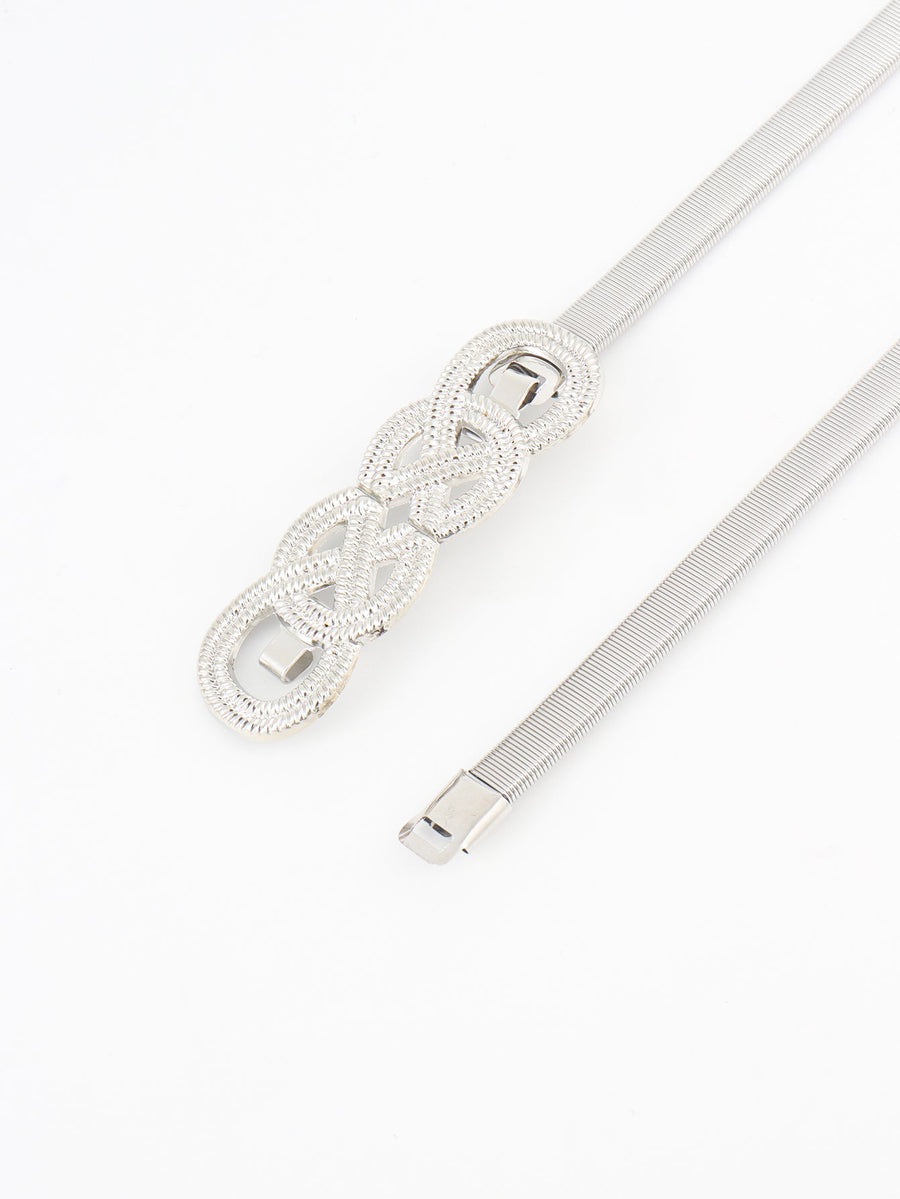 Silver elastic waist belt with intertwined knot detail and metal clasp.
