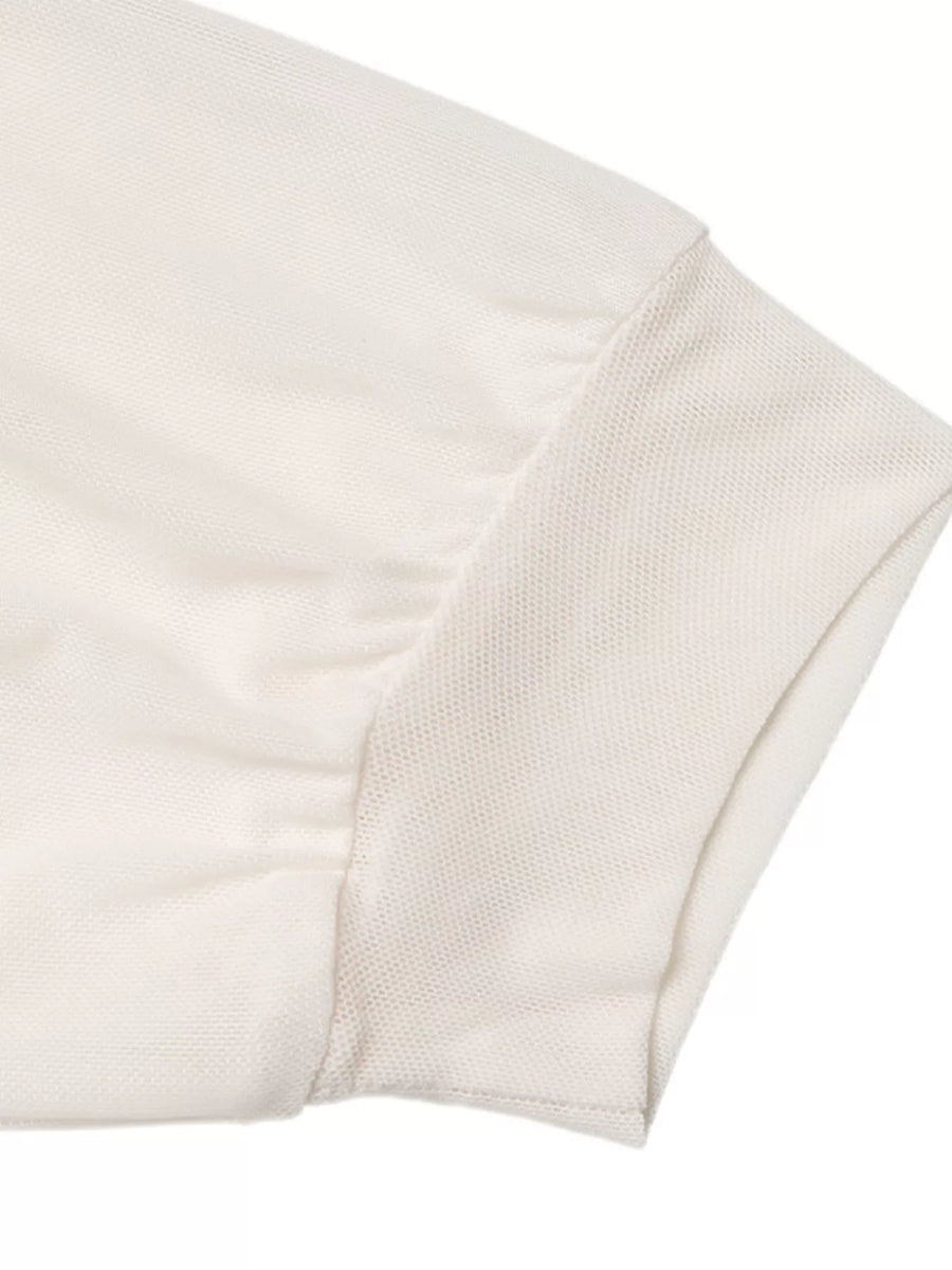Cream long-sleeve bodysuit with ruched detail and ribbed cuff