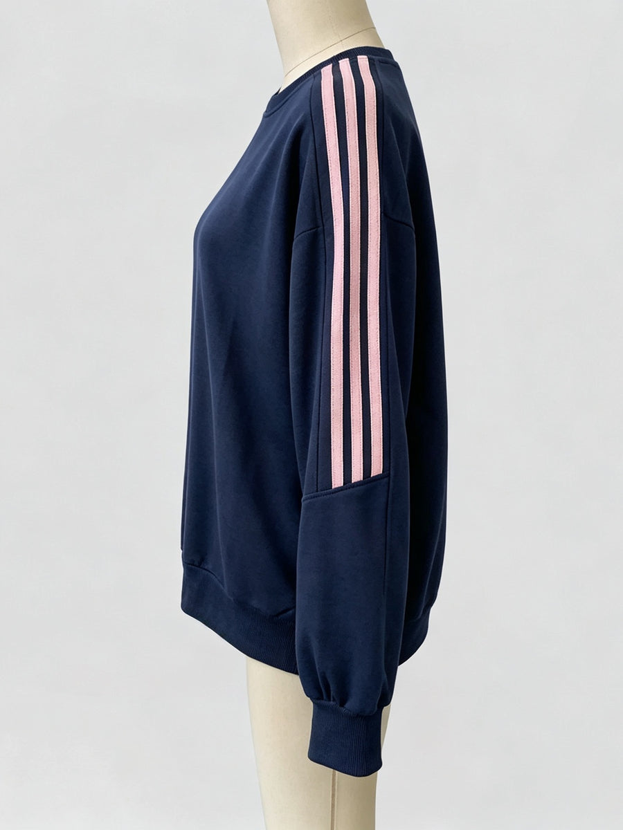navy blue sweatshirt with ribbed hem and long sleeve