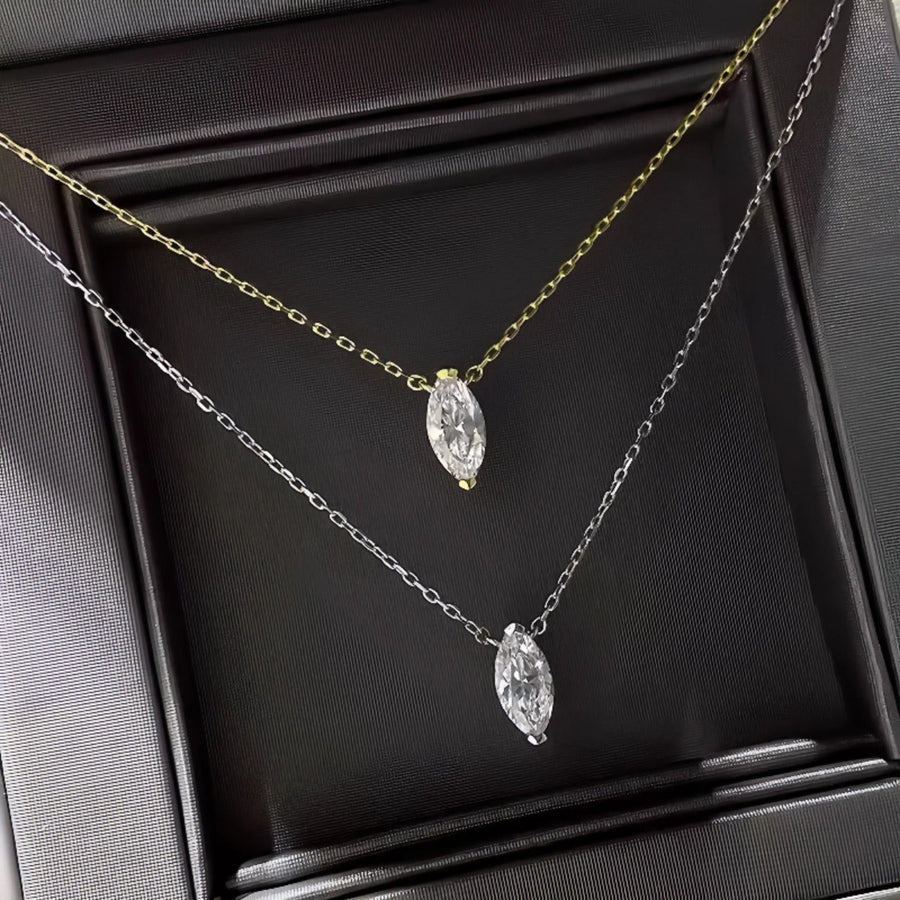 Sterling zircon pendant necklaces in gold and silver with marquise-cut stones.