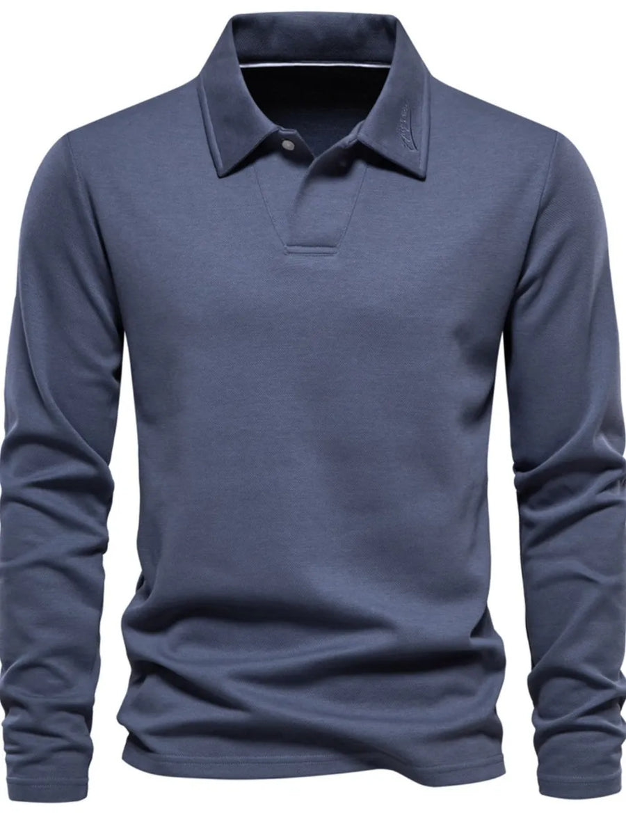 Dusty blue long sleeve polo shirt with collar detail and button placket