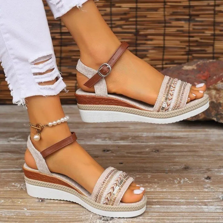 Khaki espadrille platform sandals with beaded straps and ankle buckle.