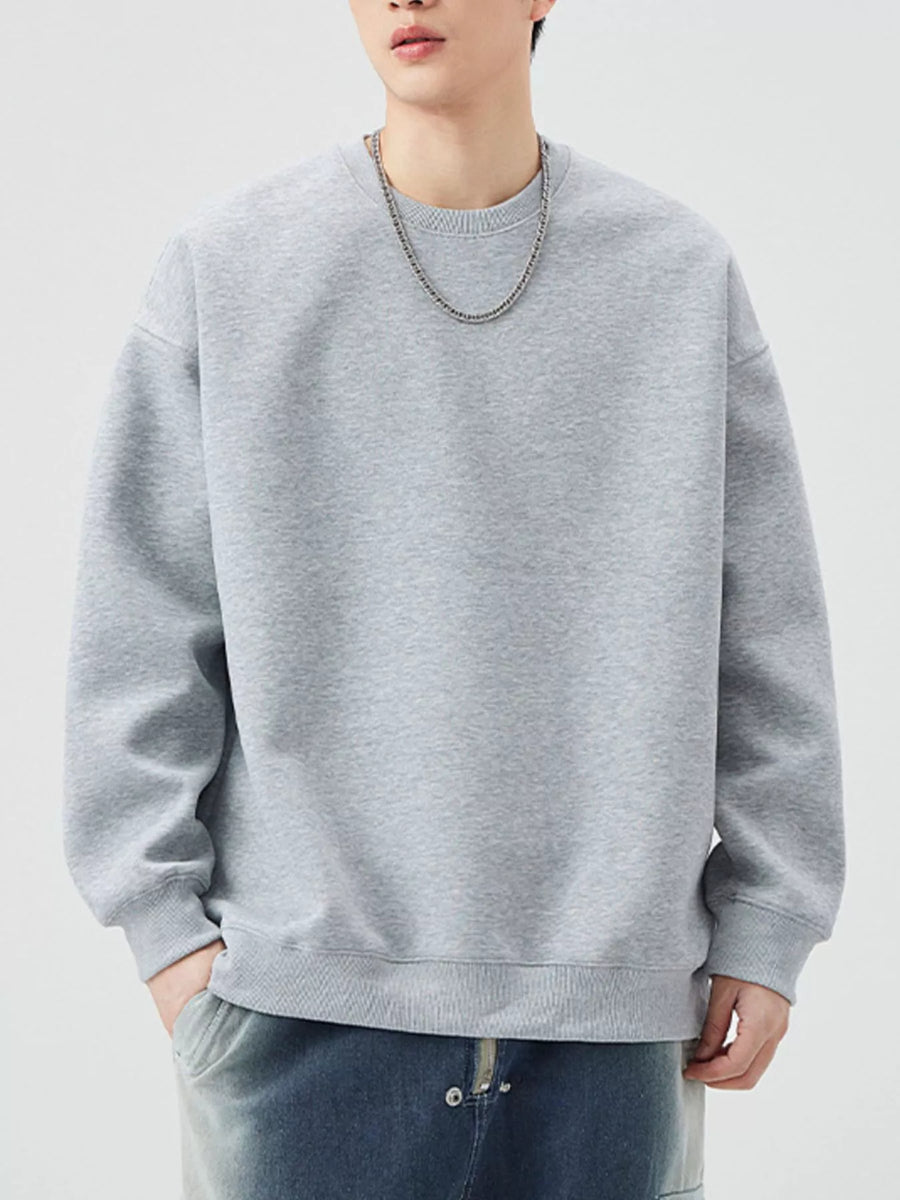 Oversized crew-neck sweatshirt in Melange Gray, with ribbed cuffs and hem.