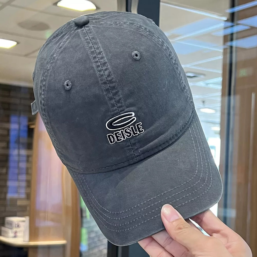 Gray cotton baseball cap with embroidered logo and adjustable strap