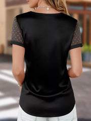 Black satin V-neck t-shirt with sheer polka dot sleeves.