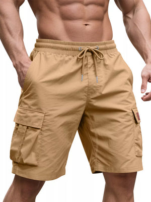 Tan adjustable cargo shorts with drawstring waist and pleated cargo pockets.