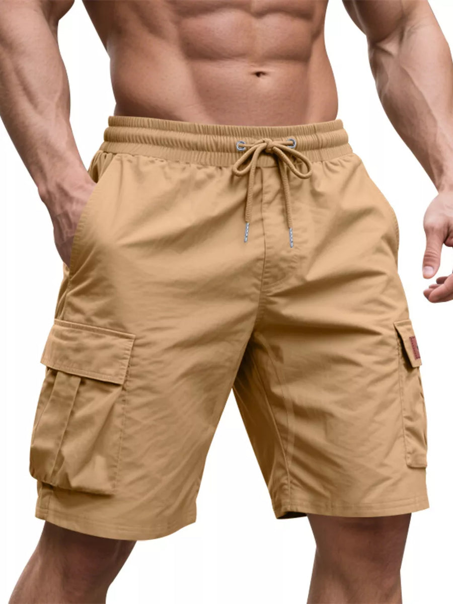 Tan adjustable cargo shorts with drawstring waist and pleated cargo pockets.