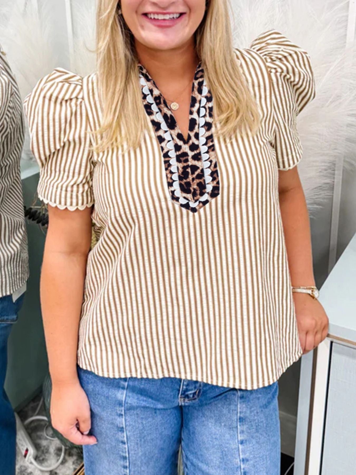 Brown and white striped cotton blouse with puff sleeves and a leopard print V-neck collar.