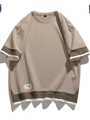 Men's beige cotton blend t-shirt with contrast stitching on sleeves and hem.
