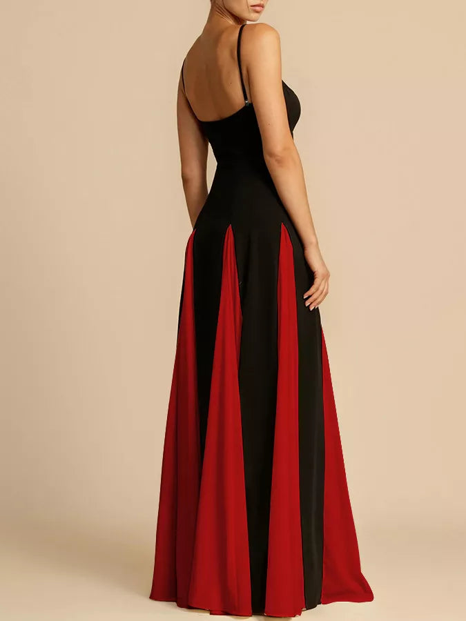 Black and red maxi dress with spaghetti straps and a flowing skirt.