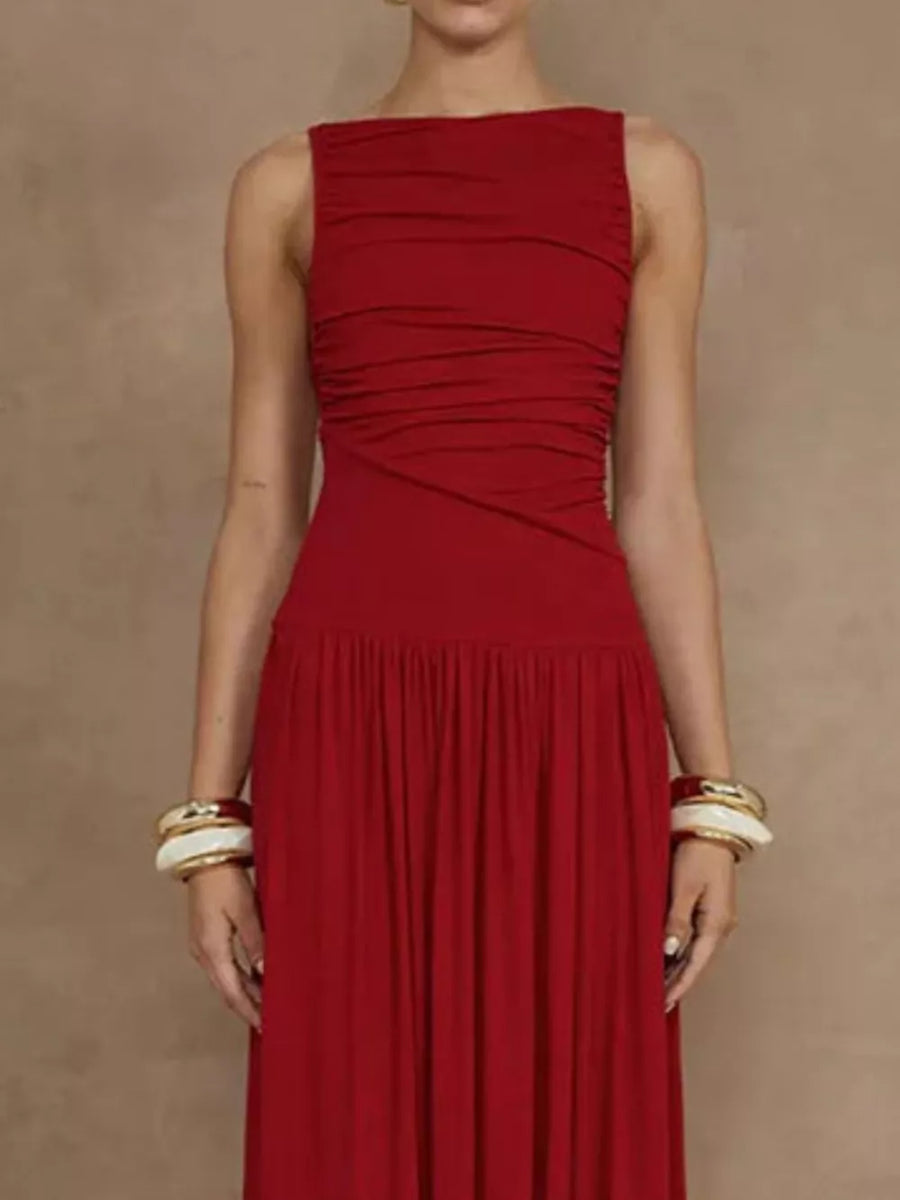 Deep red ruched maxi dress with gathered neckline and flowing skirt.