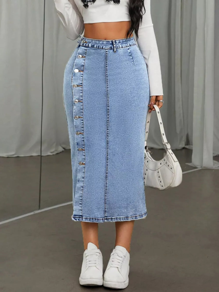 85% cotton, 15% polyester Care instructions: Machine wash cold midi skirt in light blue with straight silhouette