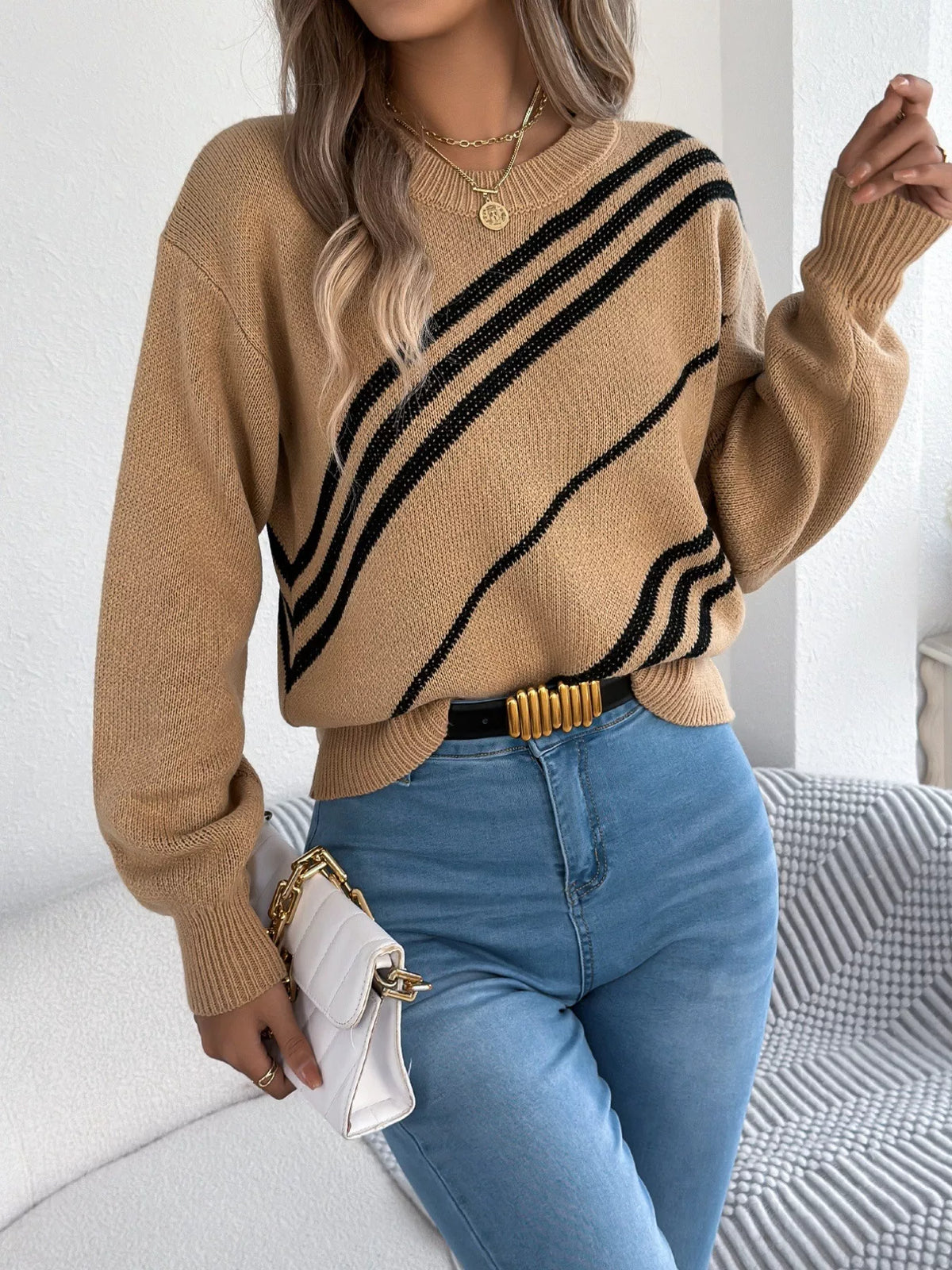 Khaki striped casual sweater with round neck and acrylic blend.