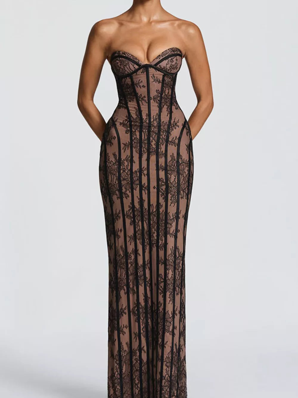 Black lace sweetheart maxi dress with corset detail and sheer overlay.