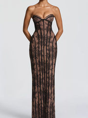 Black lace sweetheart maxi dress with corset detail and sheer overlay.