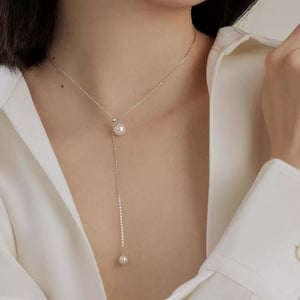 Synthetic Pearl,925 sterling silver Care instructions: Avoid wearing during exer necklace in Silver with Y-shape silhouette