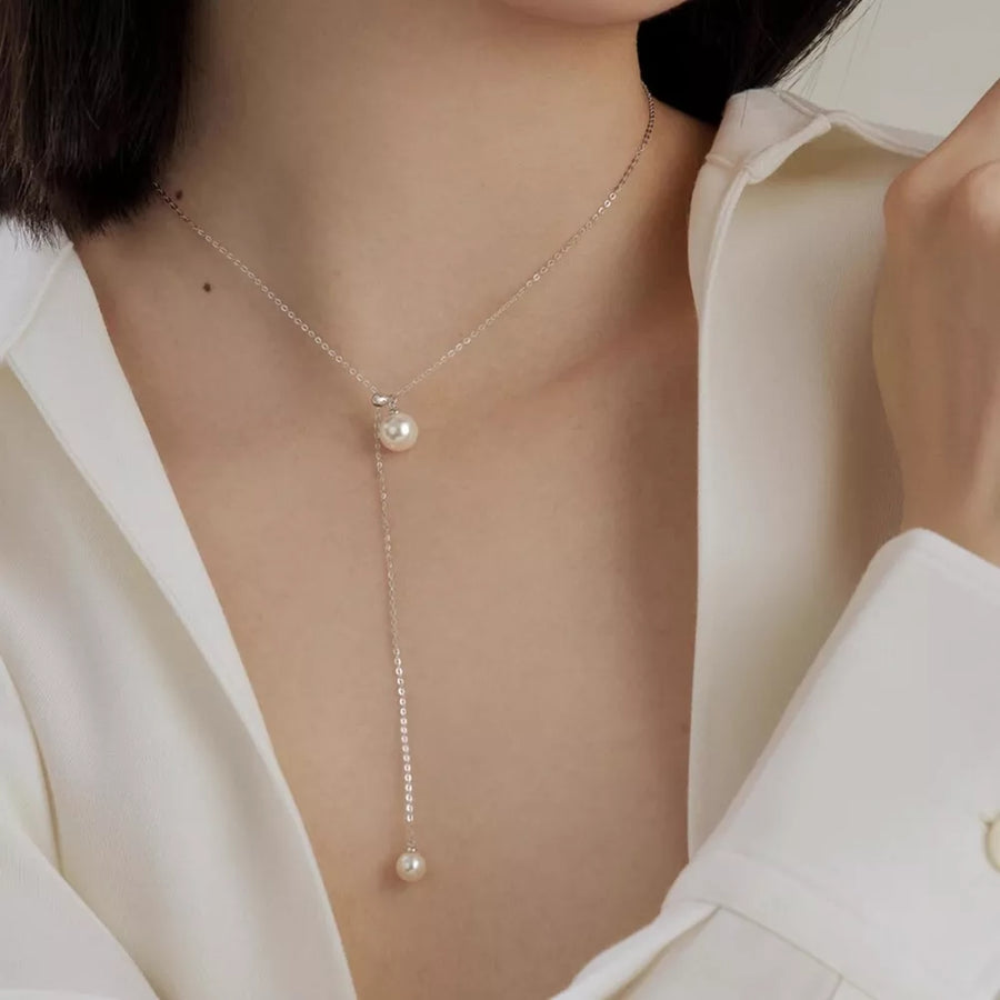 Synthetic Pearl,925 sterling silver Care instructions: Avoid wearing during exer necklace in Silver with Y-shape silhouette
