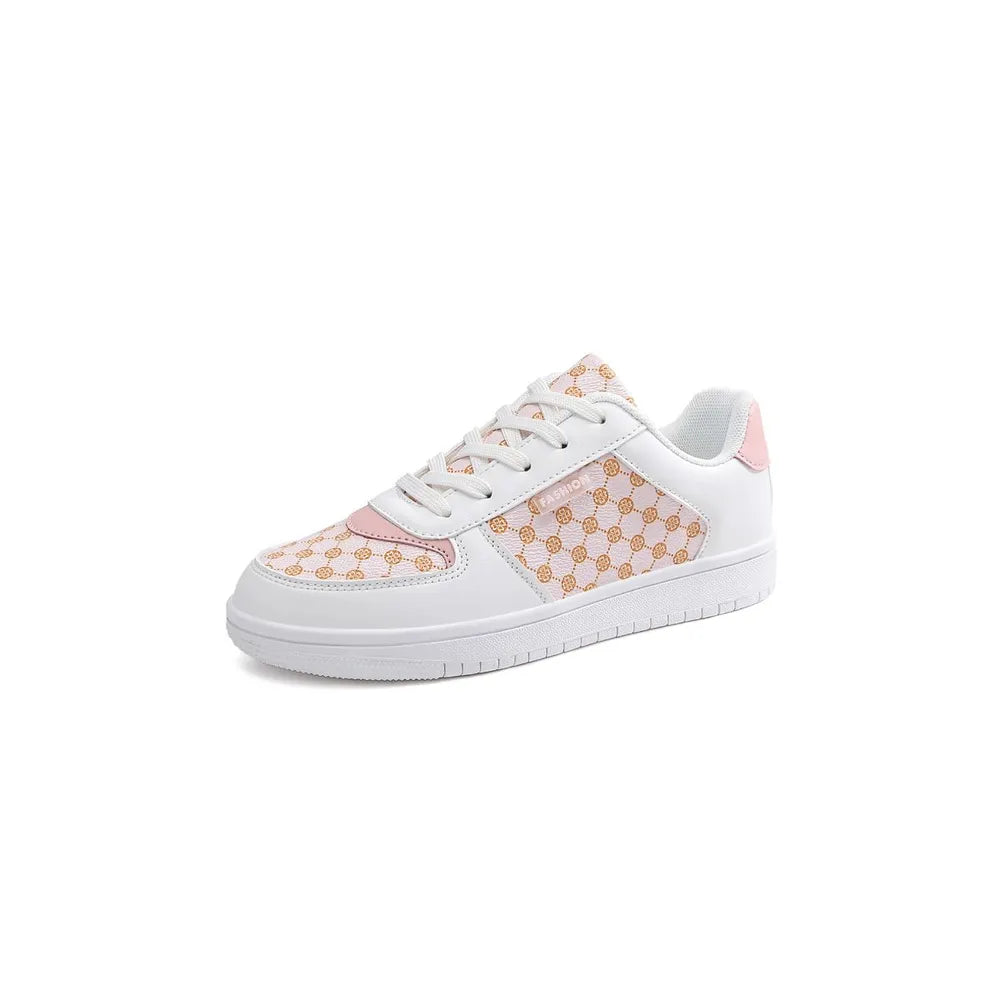 Patterned panel court sneakers in white with pink accents and a geometric pattern.
