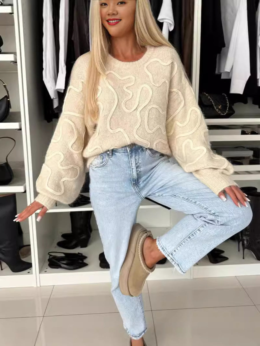 ivory pullover sweater with ribbed cuffs and long sleeve