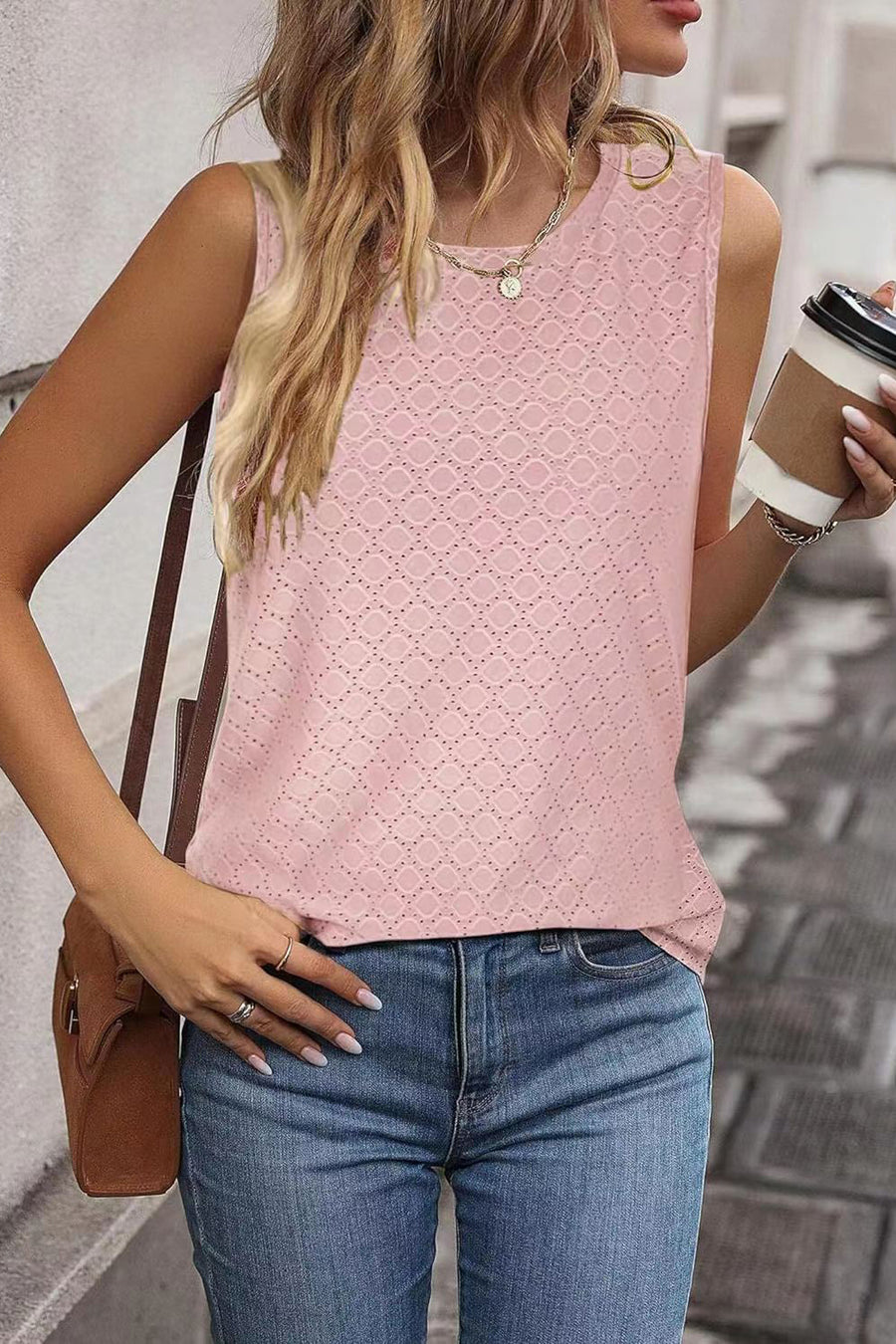 Textured sleeveless scoop neck top in blush pink with eyelet pattern