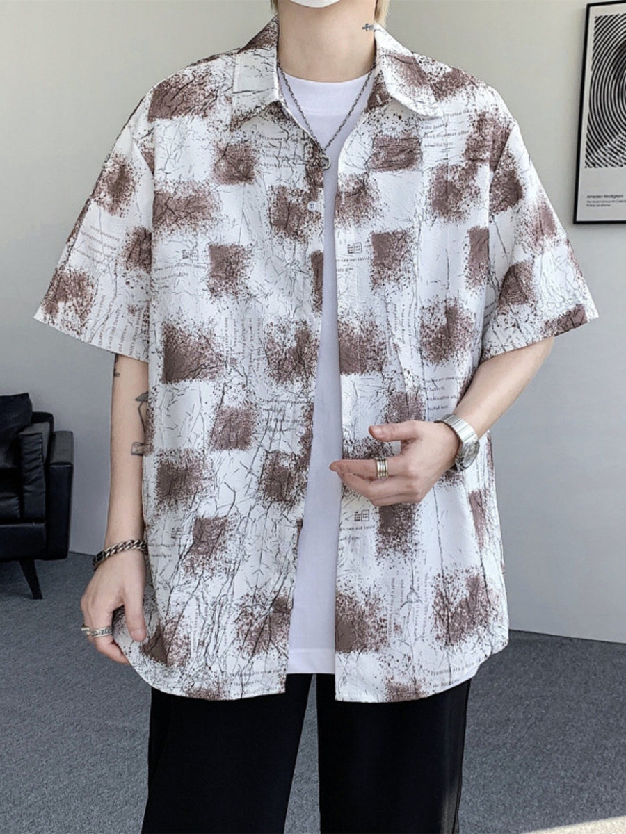 Men's short sleeve button-down shirt in abstract brown and white print, cotton.