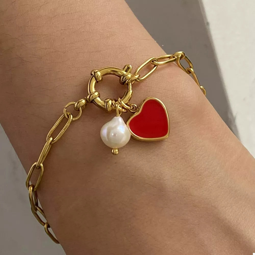bracelet in gold featuring charm detail and n/a fit