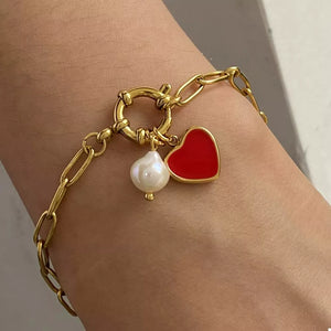 bracelet in gold featuring charm detail and n/a fit