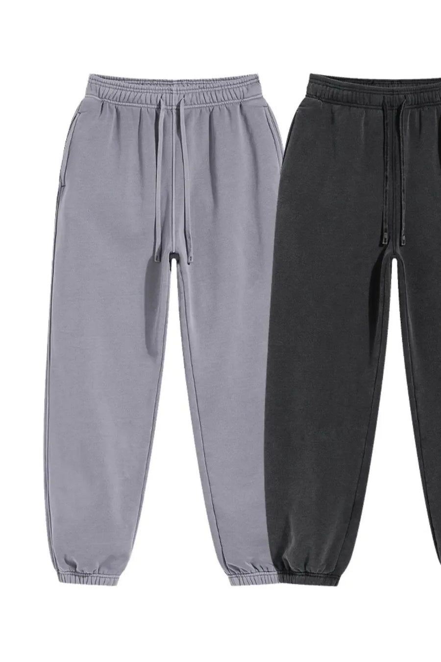 Relaxed fit gray drawstring sweatpants with elastic cuffs and pockets.