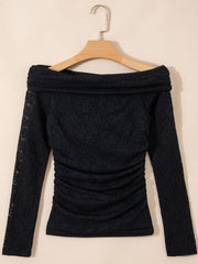 Black lace off-shoulder slim shirt with ruched sides and long sleeves.