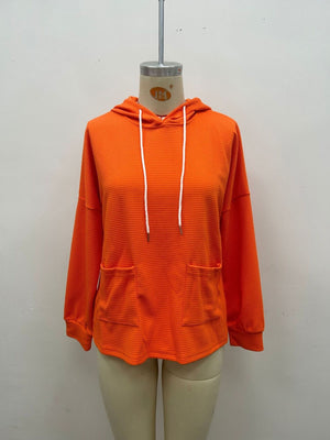 Burgundy pullover hoodie featuring waffle-knit and waffle knit