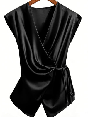 100% polyester Care instructions: Machine wash cold wrap top in Black with relaxed silhouette