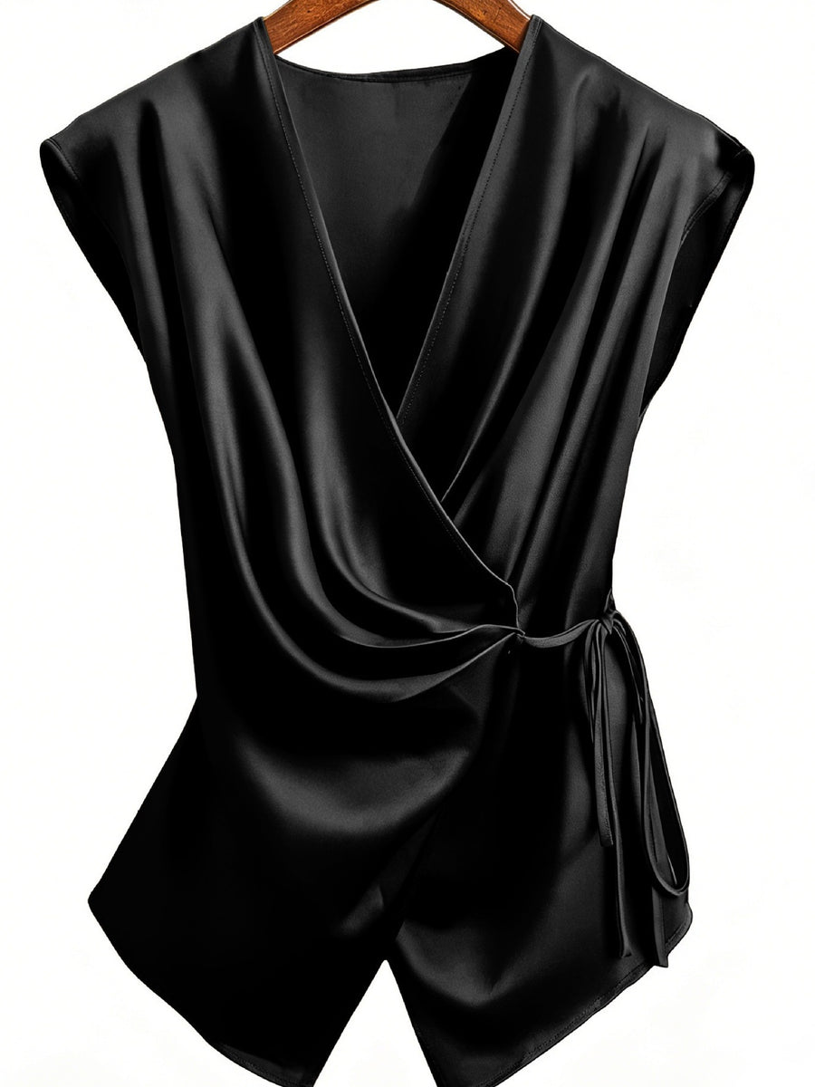 100% polyester Care instructions: Machine wash cold wrap top in Black with relaxed silhouette