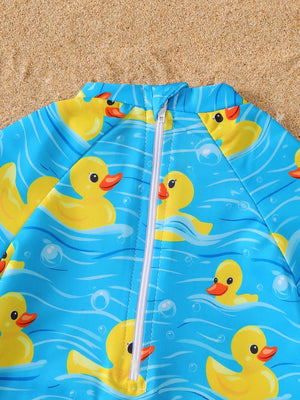 Baby blue one-piece swimsuit with yellow duck print and white zipper.
