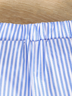 Baby shorts with blue and white vertical stripes and elastic waistband.