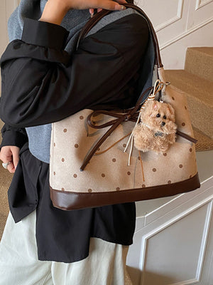 handbag in beige with polka dot and bow detail