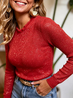 Red sequin knit sweater with crew neck and long sleeves.
