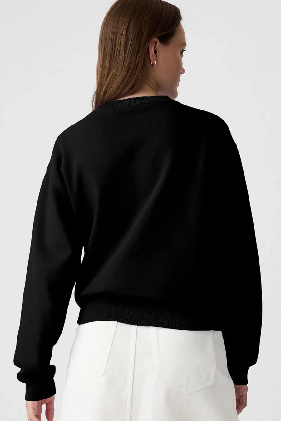 Black crewneck sweatshirt with a graphic print on the back.