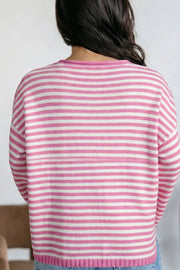 pullover sweater in white with striped and button placket