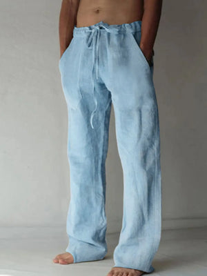 Light blue linen blend wide-leg drawstring trousers with pockets.