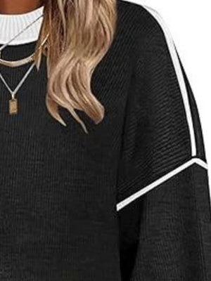 100% polyester Care instructions: Machine wash cold pullover sweater in Pink with oversized silhouette