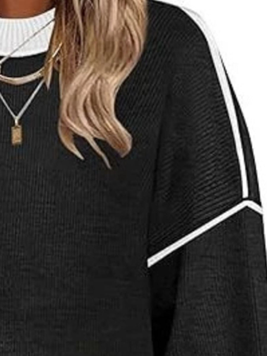 100% polyester Care instructions: Machine wash cold pullover sweater in Pink with oversized silhouette