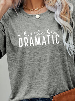 Heather gray crew neck tee with white "a little bit DRAMATIC" graphic print