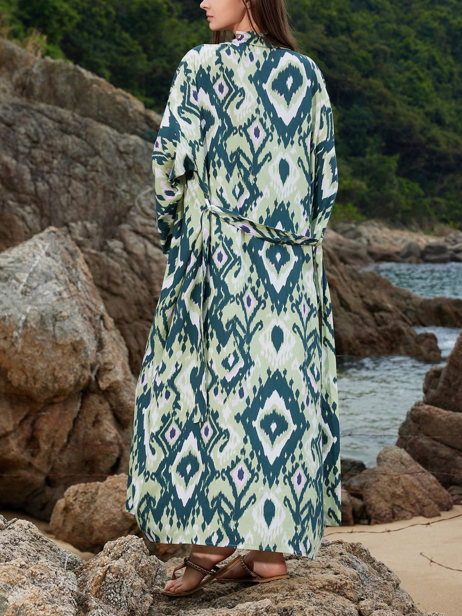 Green boho print maxi beach cover-up with a tie waist and open front.